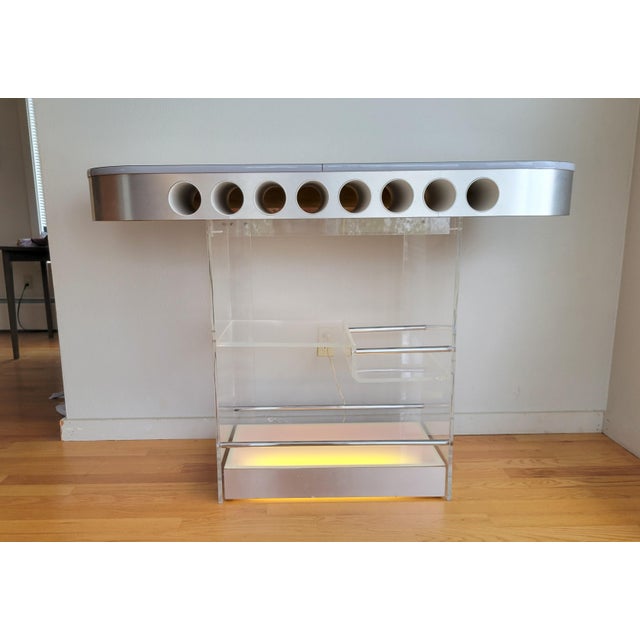 Illuminate Your Entertaining Space with a Stunning 1970s Lucite Bar! Step into retro luxury with this vintage illuminated...