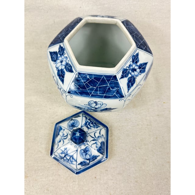 Vintage blue and white ceramic hexagon ginger jar with cover. This is a pre-owned item so please see all pictures and ask...
