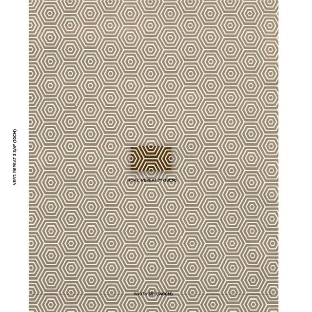 An alluring combination of dense pile and flat ground weave, Mary McDonald's Bees Knees Cut Velvet in gold is a mod...