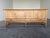 Large Danish Modern sideboard in solid oak and oak veneer, crafted in Denmark circa 1960s. This beautifully proportioned...