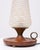 Very nice table lamp . In the shape of a older oil lamp . Teak base comes with Brass details and a spider web shade . All...