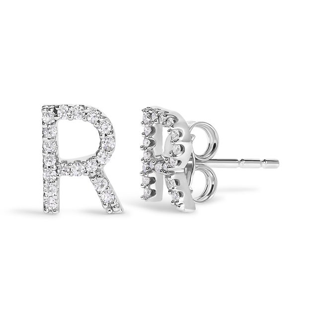 Expertly crafted to symbolize individuality and grace, this exquisite "R" initial stud earring is fashioned from radiant...