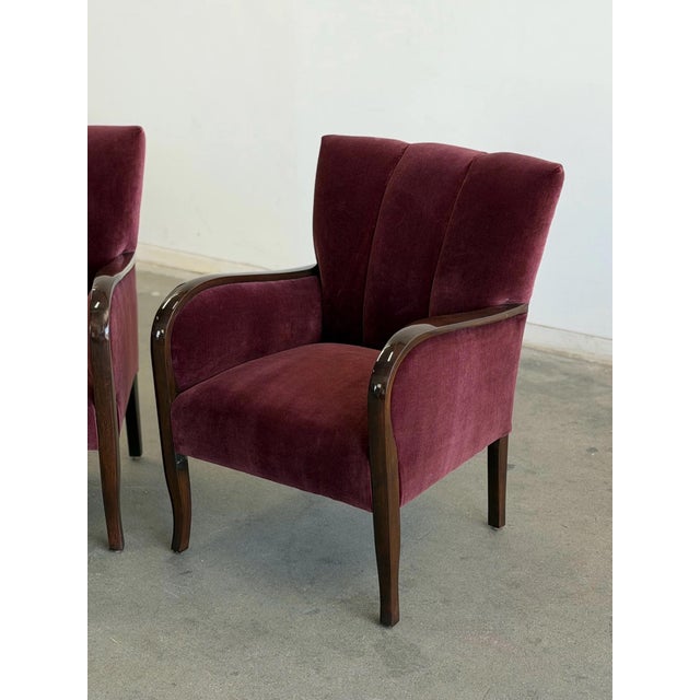 W24.25 D30 H33 SW17.5 SD18.5 SH17 AH24 This exceptional pair of vintage Swedish Art Deco club chairs bring in the...