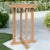 Enhance your outdoor space with the Palm Round Teak Outdoor Bar Height Bistro Table by Hi Teak, designed with a convenient...