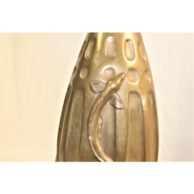 A rare find of this model by famous Art Deco Artist attributed to E. Brandt . The title is (Salamander Vase ) . Cast in...