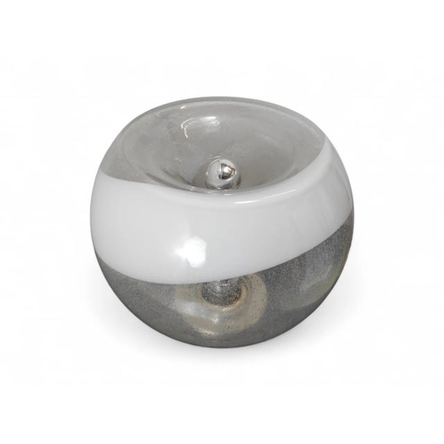 This table lamp has been transformed from suspension and ceiling lighting to table lighting for your own personal taste....