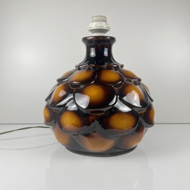 "Scaly" Ceramic Table Lamp, 1970, Double Bulbs This glazed ceramic lamp features a raised, scale-like design, typical of...