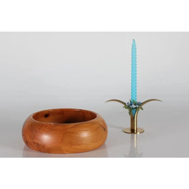 Large bowl of solid pine designed by Stig Johnsson for Smålandsslöjd, Värnamo, Sweden. The surface of the bowl is treated...