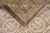 A beautiful contemporary Khotan hand-knotted with tan, and multi-color accents in a geometric design. This rug will make...
