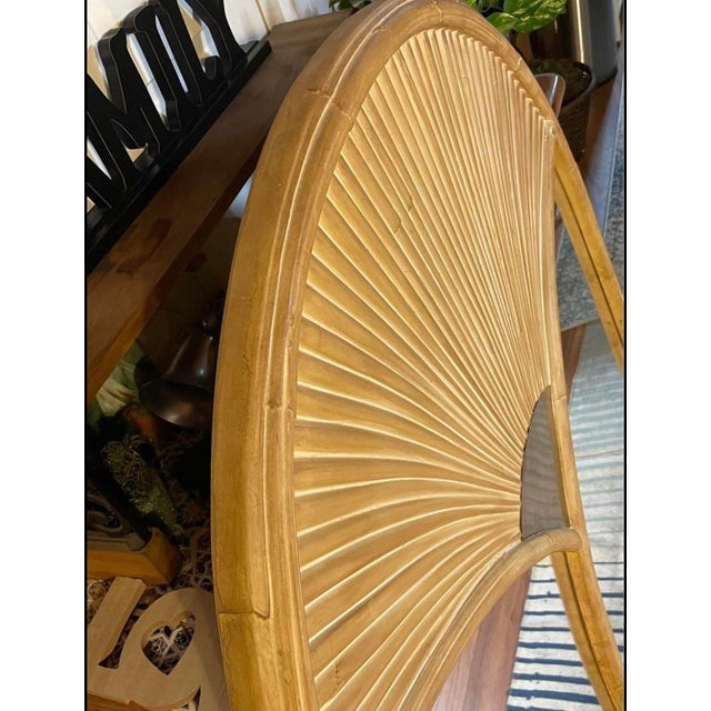 House of the Rising Sun collection console or wall mirror rendered in rattan, brass, and mirror glass design made in italy...