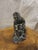 This vintage Inuit Soapstone carving depicts a hunter with a seal. These sculptures are typically handcrafted from dark...