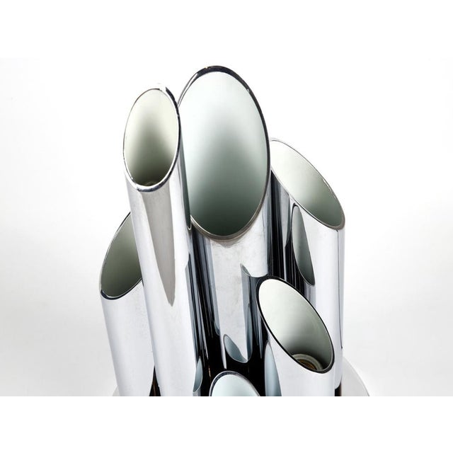 Table lamp with a chrome-plated metal base and eight glass tubes designed by Eduardo Duque for Estudios DG Madrid in the...