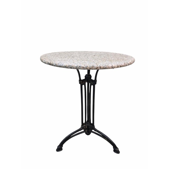 Antique Parisian Stone Top Cast Iron Bistro Table This antique Parisian bistro table is a classic and elegant piece of...
