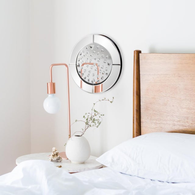 The Nina Mirror is a dazzling piece because it... well... dazzles! The entire small round piece is mirrored; frame and...