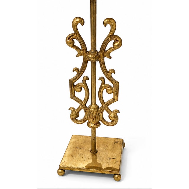 Signed gold painted table lamp by New Orleans designer Elaine Gleason featuring metal scrollwork design on top of a square...