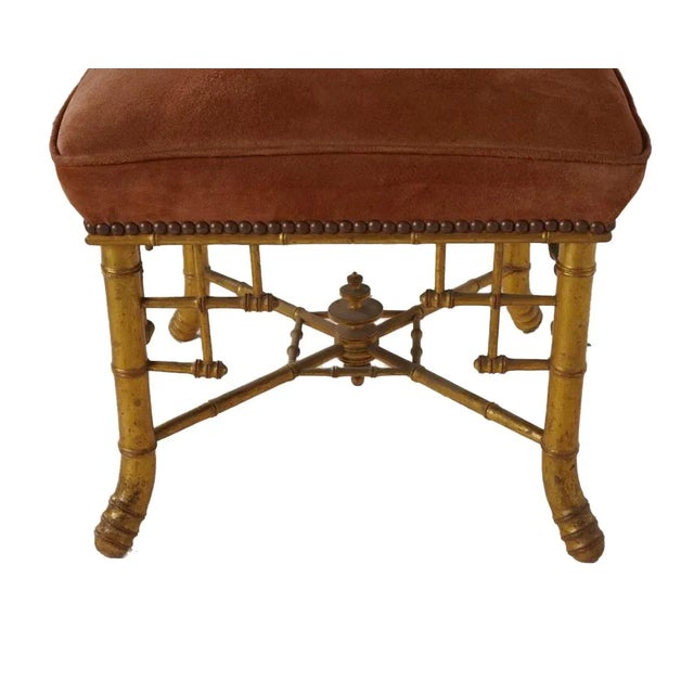 Antique Circa 1800’s Parisian Napoleon III Aesthetic Movement Stool with carved (faux) bamboo legs, a centered English...