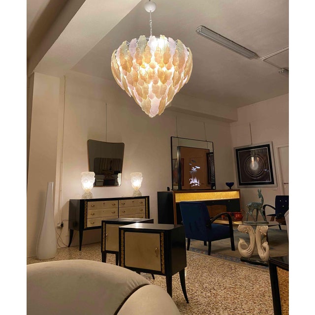 This stunning chandelier was produced in murano and features precious pink and gold leaf glass leaves. Measurements: d 90...