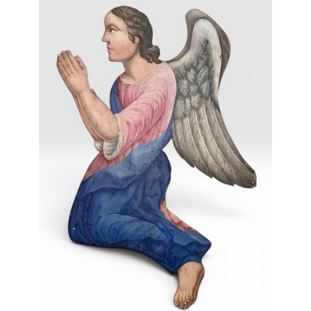 Early 19th Century Pair of Continental Polychrome and Gesso Decorated Carved Wood Adoring Angels. A substantial and...