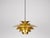 The lamp's form was designed based on the principle of a reflective system that directs light not only downward but also...