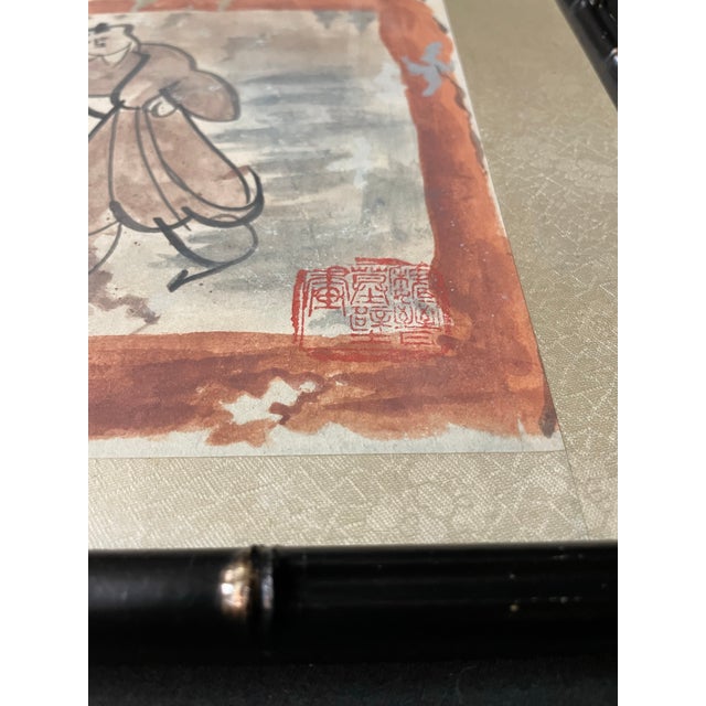 Stamped lower right. Faux bamboo frame. Striking stuff.