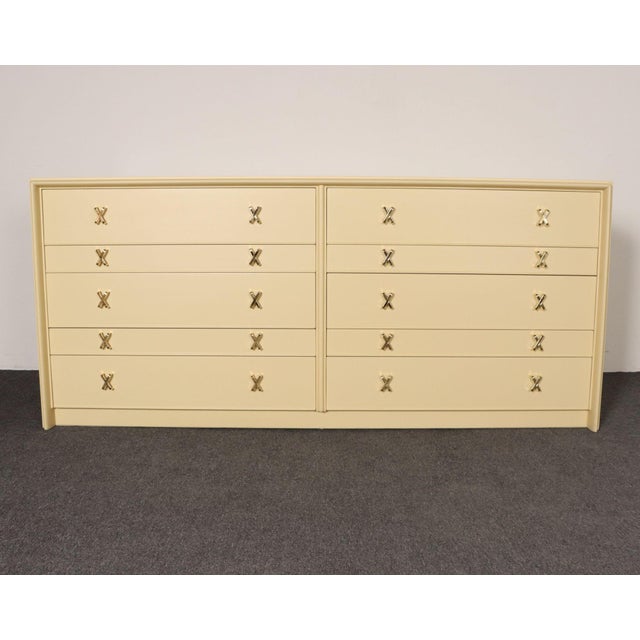 Iconic, sophisticated debonaire cabinet/dresser (Model 1031-B) designed by Paul Frankl for Johnson Furniture (ca. 1950,...