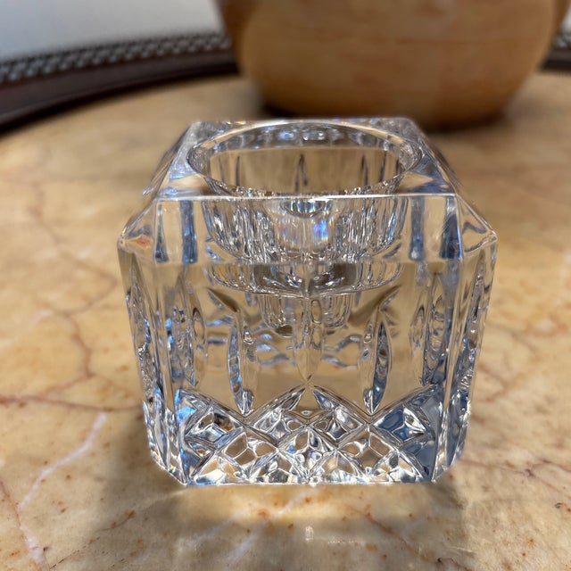 Photos do not do justice to this beautiful sparkly Waterford votive. It can accommodate a tapered candle or a tea light...