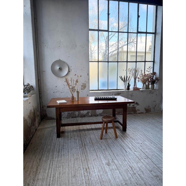Vintage 1950s farmhouse table in solid oak, with a rustic look. We particularly love its proportions and its ideal length...