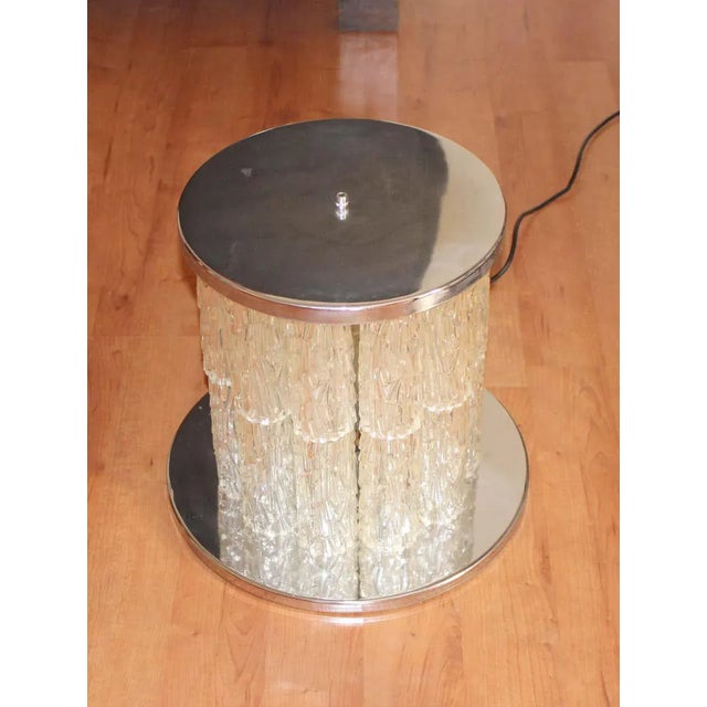 Floor lamp chrome base and acrylic tubes .Three way switch . Lamp can be a side light .