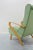 Chair of a square with arms and legs in golden beech and high backup wood for reading. The arms, forming a beautiful curve...