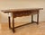 Spanish walnut drop-leaf table dating from the 1930s. This versatile piece can be used closed as a narrow table and...