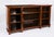 This is a beautiful antique Victorian solid walnut open breakfront dwarf bookcase, circa 1860 in date. It is fitted with...