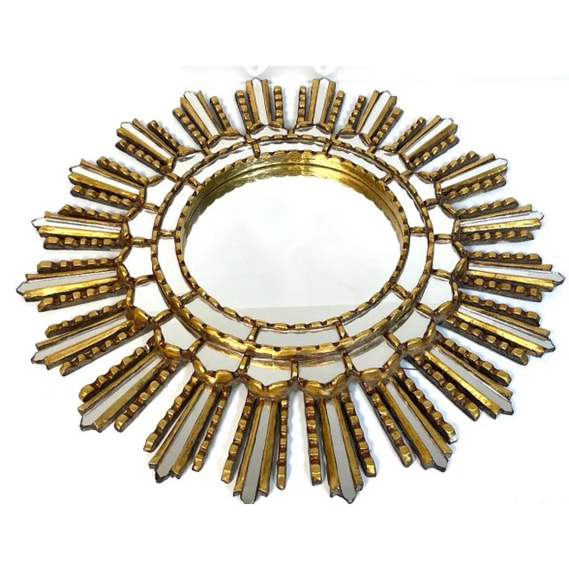 Italian modern giltwood sunburst mosaic mirror Italy, circa 1960s Of good size with a 20-inch overall diameter, with inset...