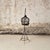 A 19th-century French bird cage crafted in iron, featuring a gracefully domed top with decorative scrollwork and a shaped...