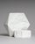 A distinctive two-piece set comprising a sculptural vase and matching ashtray from the fossil relief collection attributed...