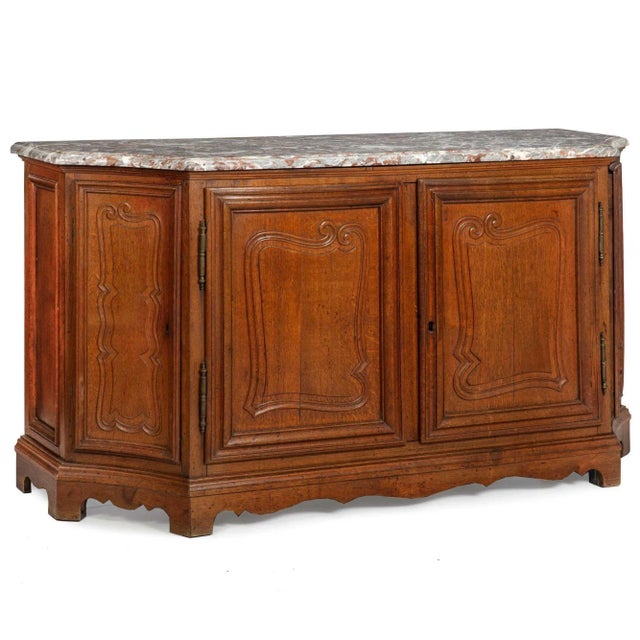FRENCH PROVINCIAL CARVED OAK "BUFFET DE CHASSE" WITH THICK GRAY MARBLE TOP With a rich patinated surface and old blue...