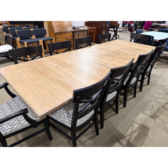 A sophisticated blend of natural warmth and tailored contemporary design, this Ethan Allen dining set pairs a generously...