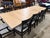 A sophisticated blend of natural warmth and tailored contemporary design, this Ethan Allen dining set pairs a generously...