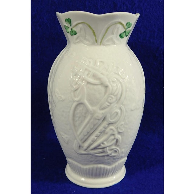 Beautiful vintage Belleek Irish ivory and green shamrock embossed porcelain vase. Just Gorgeous! Made by Belleek in...