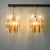 This pair of Murano glass chandeliers was produced by Mazzega, in Italy, during the 1970's. Each lamp features twelve...