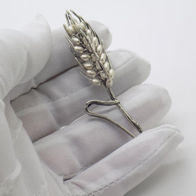 A vintage Italian silver figurine from the 1980s-1990s, hallmarked 800. This life size ear of wheat showcases Italian...