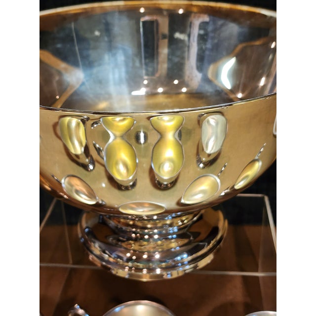 Classic silverplate Paul Revere punch bowl and footed silver on copper drinking cups. Set of twenty two cups or mugs(5"w,...