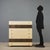 1970s dresser in white lacquered wood, featuring an elegant worked brass front that adds a distinctive touch. The solid...