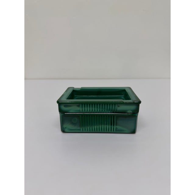 Mid-Century malachite stylized glass ashtray and cigarette box circa 1960s.