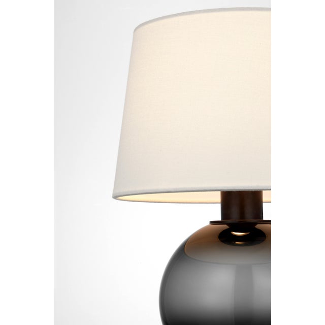 Masie Small Table Lamp in Smoked Glass with Linen Shade Designer: Chapman & Myers Height: 14.5" Shade Detail: 9" x 10.75"...
