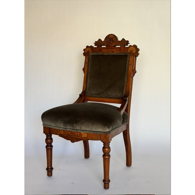Great antique side chair with incredible handcarved detail. Burlwood inlays at top. Updated with beautiful gray velvet and...