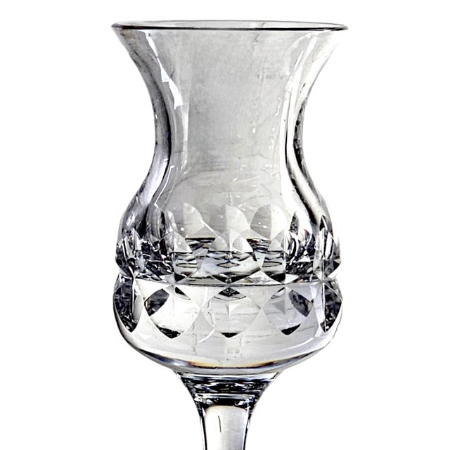 This candle holder from Kosta Boda is tall and elegant in it's styling. Kosta Boda Crystal Candle holder, Goran Warff...