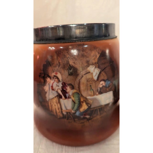 Very rare Victorian tobacco jar, glass with figural scene on front, silverplate top rim and lid with pipe handle....