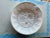 Round Ceramic Mold with Flowers . Made in Japan. Measuring 8.5"diameter and 2.5". This could be used to bake a cake in,...