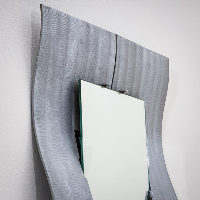 Pair of tall rectangular wall mirrors with wide cast aluminum frames. The frames feature a ribbed surface texture and a...