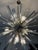 Stunning vintage Venini sputnik chandelier from the 70's. Chrome with 39 clear 12 inch triedri rods.